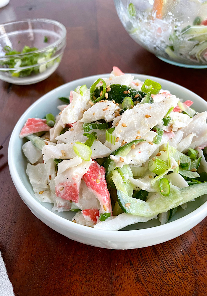 cucumber and crab meat salad on the table